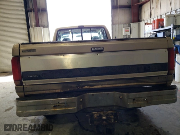 1992 Ford F-250 with VIN 1FTHX26MXNKA05058, listed as a Copart auction lot 46181044 with 200,145 mi miles and Salvage title. Bid and sale history available at DreamBid. Image 6.