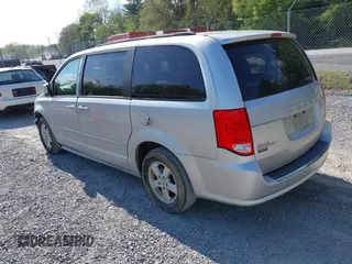 2012 Dodge Grand Caravan SXT with VIN 2C4RDGCG0CR284124, listed as a IAAI auction lot 42103224 with 131,691 mi miles and . Bid and sale history available at DreamBid. Image 3.