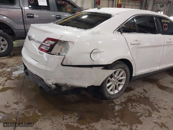 2014 Ford Taurus SE with VIN 1FAHP2D87EG182990, listed as a IAAI auction lot 41582146 with 125579 miles. Bid and sale history available at carsss.com. Image 6.