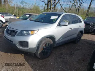 2013 Kia Sorento LX with VIN 5XYKTCA61DG405806, listed as a IAAI auction lot 41966976 with 129,942 mi miles and . Bid and sale history available at DreamBid. Image 2.
