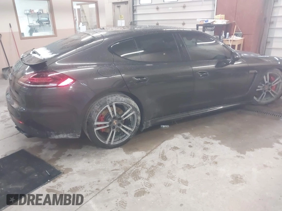 2014 Porsche Panamera GTS with VIN WP0AF2A73EL083133, listed as a IAAI auction lot 41945656 with 75,701 mi miles and . Bid and sale history available at DreamBid. Image 4.