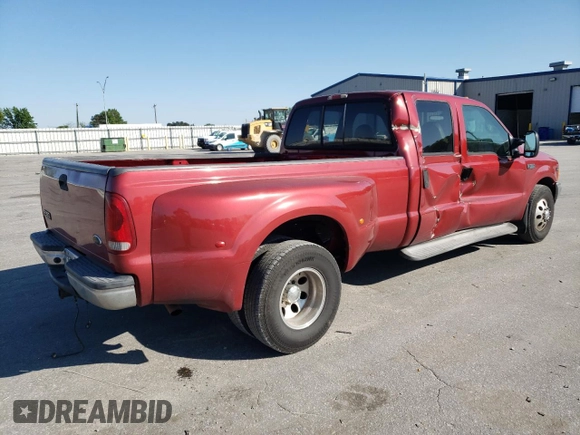 2001 Ford F-350 with VIN 1FTWW32S31EB87313, listed as a Copart auction lot 52333845 with 117,293 mi miles and Salvage title. Bid and sale history available at DreamBid. Image 3.