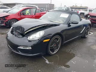 2012 Porsche Boxster with VIN WP0CA2A88CS710105, listed as a IAAI auction lot 41155672 with 108,103 mi miles. Bid and sale history available at carsss.com. Image 2.
