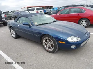 2002 Jaguar XK with VIN SAJDA42CX2NA28332, listed as a IAAI auction lot 40903126 with Not Provided miles and . Bid and sale history available at DreamBid. Image 1.