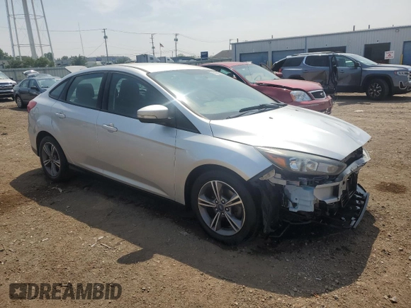 2017 Ford Focus SE with VIN 1FADP3FE7HL290271, listed as a Copart auction lot 60665615 with 130,409 mi miles and Salvage title. Bid and sale history available at DreamBid. Image 4.