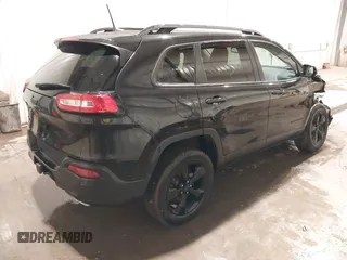 2016 Jeep Cherokee Latitude with VIN 1C4PJMCS2GW218917, listed as a IAAI auction lot 41825426 with 123,789 mi miles and . Bid and sale history available at DreamBid. Image 4.