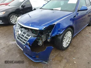 2012 Cadillac CTS with VIN 1G6DC5E59C0121787, listed as a IAAI auction lot 41718450 with 131,568 mi miles and . Bid and sale history available at DreamBid. Image 6.
