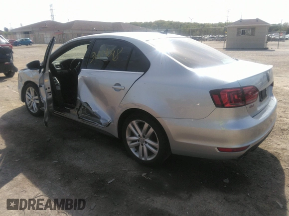 2014 Volkswagen Jetta GLI Autobahn z VIN 3VW5S7AJ4EM396791, wystawiony jako IAAI lot #39648541 z przebiegiem 103 025 mil mil oraz . Historia ofert i sprzedaży dostępna na DreamBid. Obrazek 3.