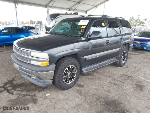 2003 Chevrolet Tahoe LS with VIN 1GNEC13T83R282176, listed as a IAAI auction lot 41815032 with 173,001 mi miles. Bid and sale history available at carsss.com. Image 2.