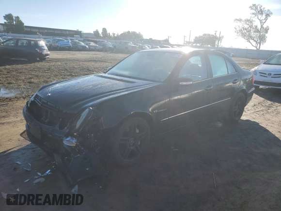 2003 Mercedes-Benz E-Class 5.5L AMG with VIN WDBUF76J73A364731, listed as a Copart auction lot 87019114 with 187,696 mi miles and Salvage Title. Bid and sale history available at carsss.com. Image 1.