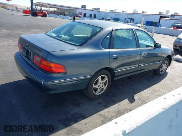 1998 Toyota Avalon XL with VIN 4T1BF18BXWU267131, listed as a IAAI auction lot 41518513 with 208,023 mi miles and . Bid and sale history available at DreamBid. Image 4.