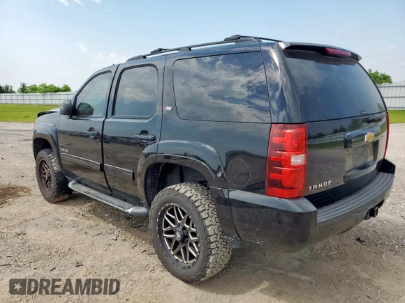 2013 Chevrolet Tahoe LT with VIN 1GNSKBE0XDR132697, listed as a Copart auction lot 57252575 with 166,956 mi miles and Salvage title. Bid and sale history available at DreamBid. Image 2.