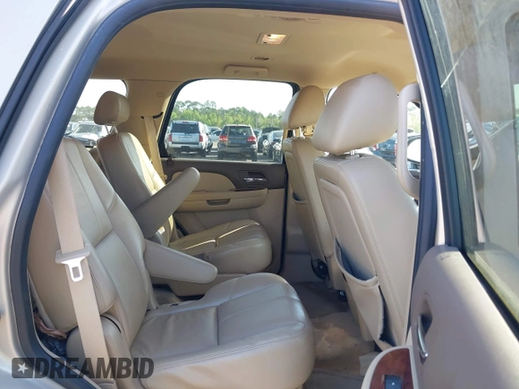 2010 GMC Yukon SLT with VIN 1GKMCCE3XAR225380, listed as a IAAI auction lot 41904723 with 173,686 mi miles. Bid and sale history available at carsss.com. Image 8.