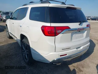 2018 GMC Acadia Denali with VIN 1GKKNPLS3JZ148659, listed as a IAAI auction lot 42158711 with 104,698 mi miles and . Bid and sale history available at DreamBid. Image 3.