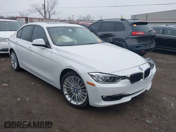 2014 BMW 3 Series 335i with VIN WBA3A9G50ENS65136, listed as a IAAI auction lot 41504021 with 60,892 mi miles. Bid and sale history available at carsss.com. Image 1.