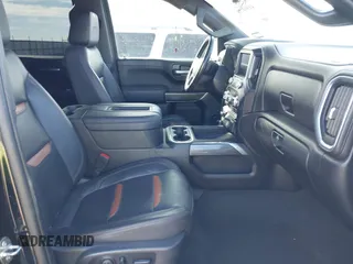 2021 GMC Sierra 1500 AT4 with VIN 1GTU9EETXMZ230606, listed as a IAAI auction lot 41599778 with 128,745 mi miles. Bid and sale history available at carsss.com. Image 5.