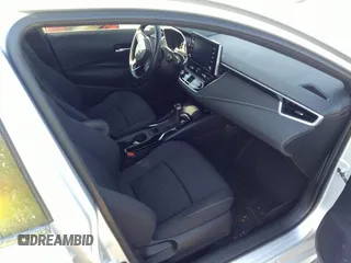2022 Toyota Corolla SE with VIN JTND4MBE4N3150989, listed as a IAAI auction lot 40565981 with 51,377 mi miles and . Bid and sale history available at DreamBid. Image 5.