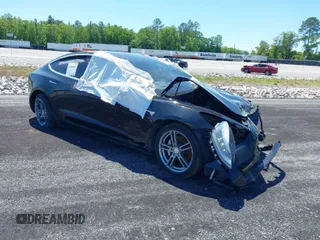 2019 Tesla Model 3 Long Range with VIN 5YJ3E1EBXKF208941, listed as a IAAI auction lot 40259510 with 80,971 mi miles. Bid and sale history available at carsss.com. Image 1.