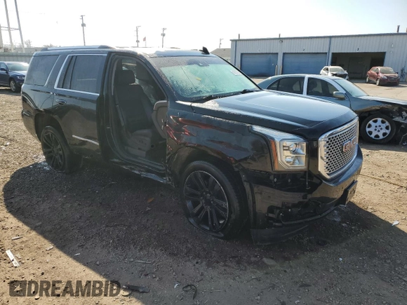 2016 GMC Yukon Denali with VIN 1GKS2CKJ9GR301628, listed as a Copart auction lot 48937035 with 121,863 mi miles and Salvage Title. Bid and sale history available at carsss.com. Image 4.