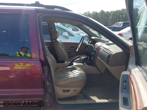 1999 Jeep Grand Cherokee Limited with VIN 1J4GW68N8XC595697, listed as a IAAI auction lot 41917466 with 177,944 mi miles. Bid and sale history available at carsss.com. Image 5.