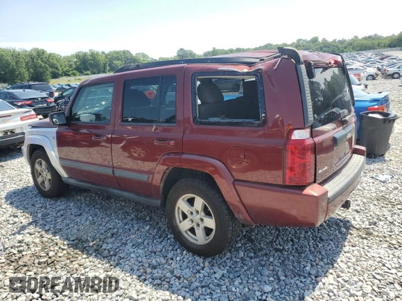 2007 Jeep Commander Sport with VIN 1J8HG48K07C684965, listed as a Copart auction lot 58061005 with 208,951 mi miles and Salvage title. Bid and sale history available at DreamBid. Image 2.