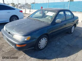 1997 Toyota Corolla with VIN 1NXBA02E5VZ595972, listed as a IAAI auction lot 41622050 with 143,577 mi miles. Bid and sale history available at carsss.com. Image 2.