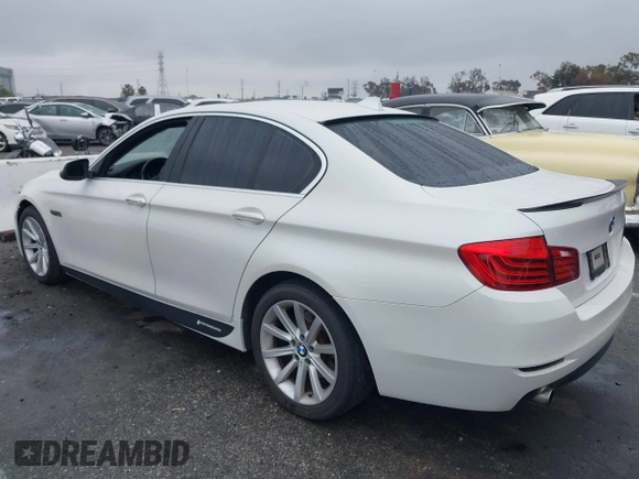 2014 BMW 5 Series 535i with VIN WBA5B1C57ED475963, listed as a IAAI auction lot 41914997 with 92,037 mi miles and . Bid and sale history available at DreamBid. Image 14.