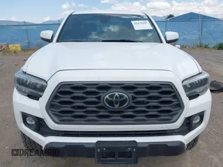 2022 Toyota Tacoma SR with VIN 3TMCZ5AN1NM478457, listed as a IAAI auction lot 42479107 with 59,547 mi miles and . Bid and sale history available at DreamBid. Image 13.
