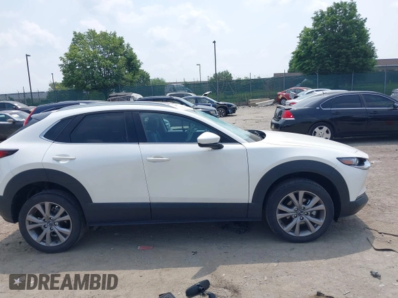 2021 Mazda CX-30 Premium with VIN 3MVDMBDL0MM307045, listed as a IAAI auction lot 42446494 with 33,112 mi miles and . Bid and sale history available at DreamBid. Image 14.