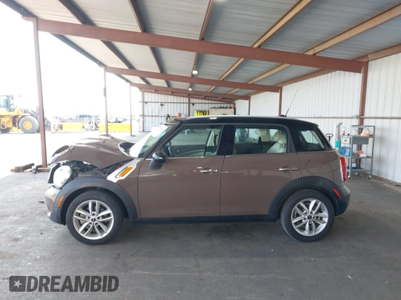 2012 MINI Countryman with VIN WMWZB3C51CWM04563, listed as a IAAI auction lot 42564564 with 95,760 mi miles and . Bid and sale history available at DreamBid. Image 14.