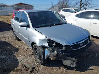 2011 Kia Rio LX with VIN KNADH4A38B6747739, listed as a IAAI auction lot 41431277 with 172,966 mi miles. Bid and sale history available at carsss.com. Image 1.