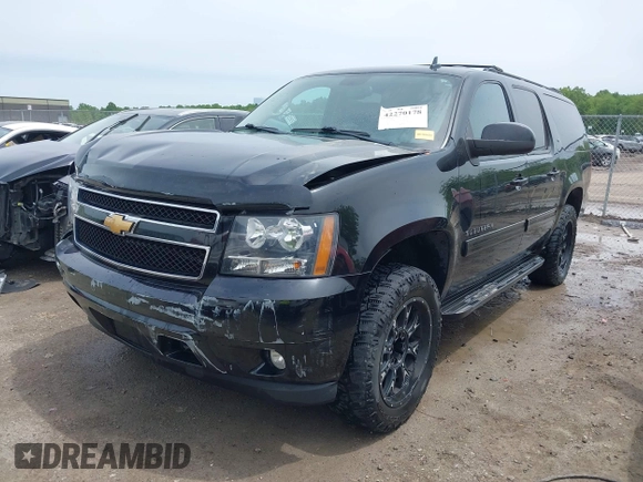 2012 Chevrolet Suburban LT with VIN 1GNSKJE75CR189265, listed as a IAAI auction lot 42270178 with 171,219 mi miles and . Bid and sale history available at DreamBid. Image 2.