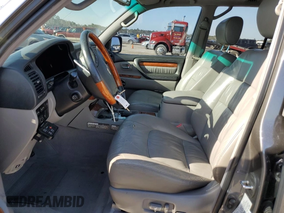 2006 Lexus LX 470 z VIN JTJHT00W664007502, wystawiony jako Copart lot #47871885 z przebiegiem 172 552 mil mil oraz Szkoda całkowita • Salvage title. Historia ofert i sprzedaży dostępna na DreamBid. Obrazek 7.