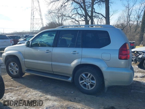 2003 Lexus GX 470 with VIN JTJBT20XX30015034, listed as a IAAI auction lot 41386690 with 234,983 mi miles. Bid and sale history available at carsss.com. Image 14.