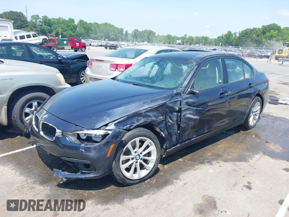2017 BMW 3 Series 320i z VIN WBA8E1G58HNU14926, wystawiony jako IAAI lot #42150462 z przebiegiem 143 655 mil mil oraz . Historia ofert i sprzedaży dostępna na DreamBid. Obrazek 2.