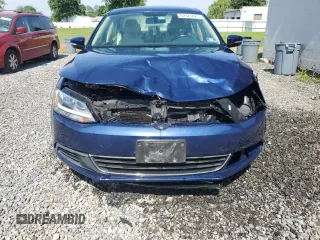 2014 Volkswagen Jetta SE z VIN 3VWD17AJ8EM413915, wystawiony jako Copart lot #62325025 z przebiegiem 131 112 mil mil oraz Szkoda całkowita • Salvage title. Historia ofert i sprzedaży dostępna na DreamBid. Obrazek 5.