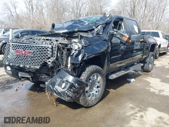 2015 GMC Sierra 2500HD available WiFi Denali with VIN 1GT120E89FF668110, listed as a IAAI auction lot 41805520 with 1 mi miles. Bid and sale history available at carsss.com. Image 2.