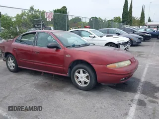 2002 Oldsmobile Alero GL1 z VIN 1G3NL52F62C304852, wystawiony jako IAAI lot #42368455 z przebiegiem Nie podano mil oraz . Historia ofert i sprzedaży dostępna na DreamBid. Obrazek 1.