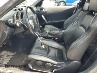 2005 Nissan 350Z with VIN JN1AZ34D65M610383, listed as a Copart auction lot 63184204 with 66,806 mi miles and Salvage Title. Bid and sale history available at DreamBid. Image 7.