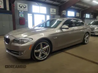2013 BMW 5 Series 535i xDrive with VIN WBAFU7C57DDU74909, listed as a Copart auction lot 64053715 with 115,521 mi miles and Clean title. Bid and sale history available at DreamBid. Image 1.