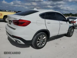 2015 BMW X6 xDrive35i with VIN 5UXKU2C51F0N76753, listed as a Copart auction lot 73558353 with 66,019 mi miles. Bid and sale history available at carsss.com. Image 3.