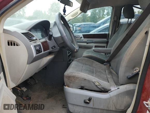 2009 Chrysler Town & Country Touring with VIN 2A8HR54199R678640, listed as a Copart auction lot 58213814 with 264,796 mi miles and Non Repairable. Bid and sale history available at DreamBid. Image 7.
