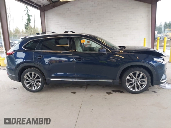 2018 Mazda CX-9 Grand Touring with VIN JM3TCBDY0J0216195, listed as a IAAI auction lot 41976122 with 90,083 mi miles and . Bid and sale history available at DreamBid. Image 13.