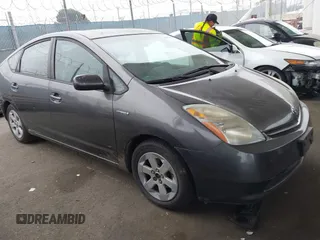 2009 Toyota Prius z VIN JTDKB20UX93465477, wystawiony jako IAAI lot #42453214 z przebiegiem 226 567 mil mil oraz . Historia ofert i sprzedaży dostępna na DreamBid. Obrazek 1.
