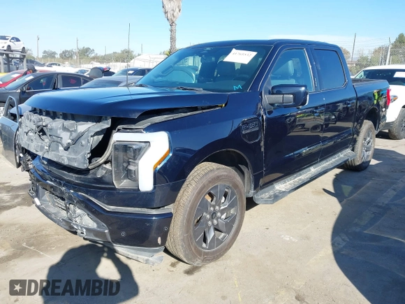 2022 Ford F-150 Lightning Pro z VIN 1FT6W1EV8NWG04113, wystawiony jako IAAI lot #41765532 z przebiegiem 48 990 mil mil oraz . Historia ofert i sprzedaży dostępna na DreamBid. Obrazek 23.