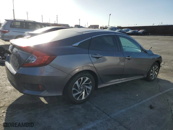 2016 Honda Civic Sedan EX with VIN 19XFC2F74GE229932, listed as a Copart auction lot 50645955 with 131,119 mi miles and Salvage Title. Bid and sale history available at carsss.com. Image 3.