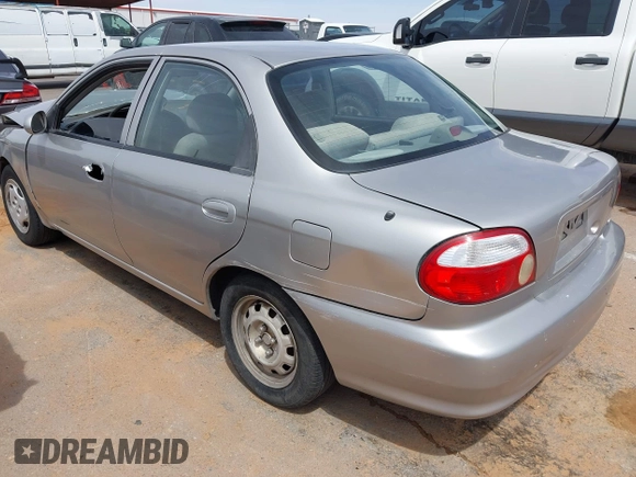 2001 Kia Sephia with VIN KNAFB121815081573, listed as a IAAI auction lot 42058297 with 112,069 mi miles and . Bid and sale history available at DreamBid. Image 3.