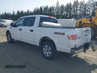 2015 Ford F-150 XLT with VIN 1FTEW1EP4FKE54734, listed as a IAAI auction lot 42137158 with 153,991 mi miles. Bid and sale history available at carsss.com. Image 3.