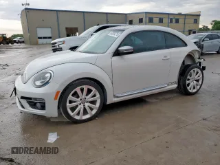2014 Volkswagen Beetle 1.8T с VIN 3VWJ17AT5EM652990, выставлен на аукционе Copart как лот 60094715 с пробегом 109 911 миль миль и Списание • Salvage title. История ставок и продаж доступна на DreamBid. Изображение 1.