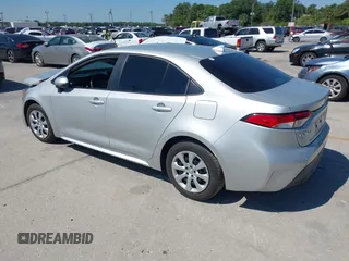 2023 Toyota Corolla LE with VIN 5YFB4MDE8PP053698, listed as a IAAI auction lot 42052631 with 26,766 mi miles. Bid and sale history available at carsss.com. Image 3.